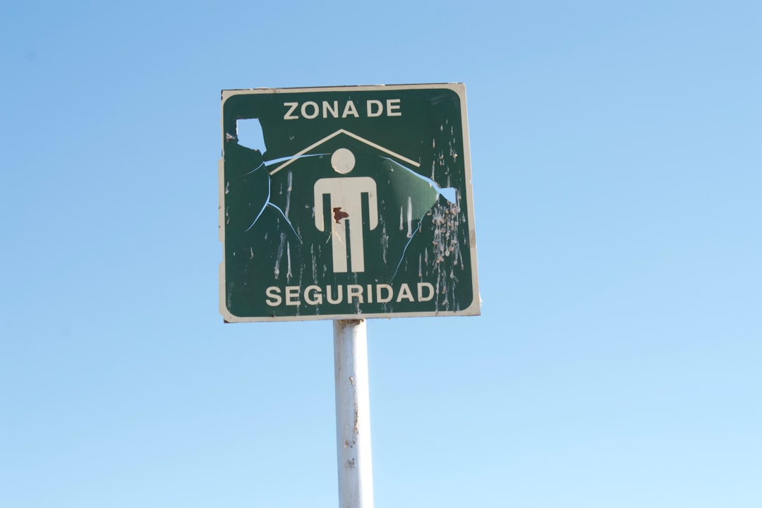 a street sign with a picture of a person on it